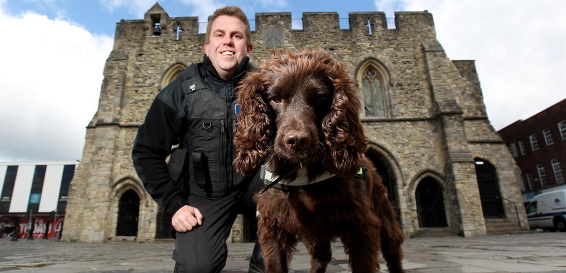 Dog handler Stuart Phillips with specialist tobacco sniffer dog Yoyo.